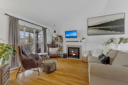 45 Dowler Street, Red Deer, AB - Indoor Photo Showing Living Room With Fireplace