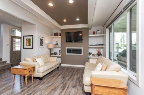 217 Van Slyke Way, Red Deer, AB - Indoor Photo Showing Living Room With Fireplace