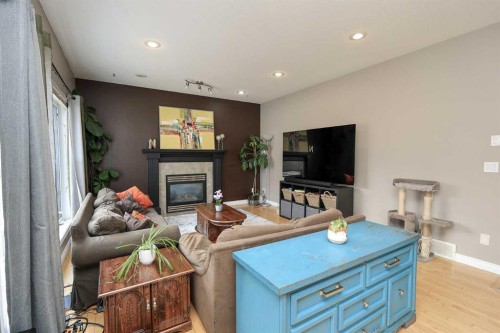 193 Alberts Close, Red Deer, AB - Indoor Photo Showing Living Room With Fireplace