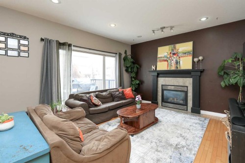 193 Alberts Close, Red Deer, AB - Indoor Photo Showing Living Room With Fireplace