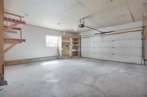 19 Lang Close, Red Deer, AB - Indoor Photo Showing Garage