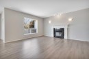 19 Lang Close, Red Deer, AB  - Indoor Photo Showing Living Room With Fireplace 