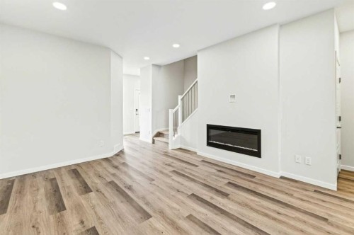 163 Lincoln Crescent, Rural Red Deer County, AB - Indoor With Fireplace