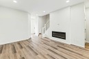 163 Lincoln Crescent, Rural Red Deer County, AB  - Indoor With Fireplace 