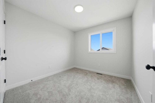 81 Pinnacle Close, Blackfalds, AB - Indoor Photo Showing Other Room