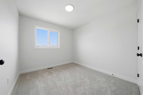 85 Pinnacle Close, Blackfalds, AB - Indoor Photo Showing Other Room