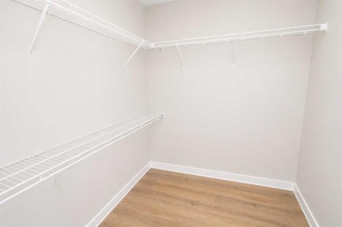 4438 Van Eaton Way, Clive, AB - Indoor With Storage
