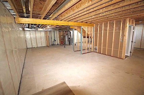 4438 Van Eaton Way, Clive, AB - Indoor Photo Showing Basement