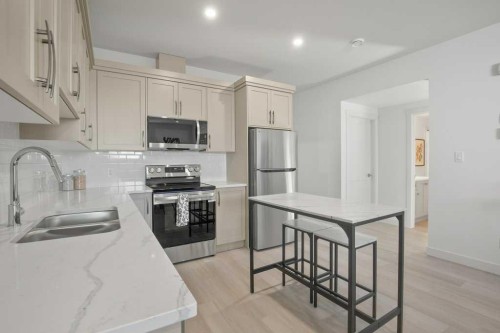 4 Emmett Crescent, Red Deer, AB - Indoor Photo Showing Kitchen With Double Sink