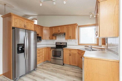48 Duval Close, Red Deer, AB - Indoor Photo Showing Kitchen With Double Sink