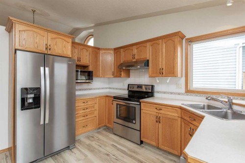 48 Duval Close, Red Deer, AB - Indoor Photo Showing Kitchen With Double Sink
