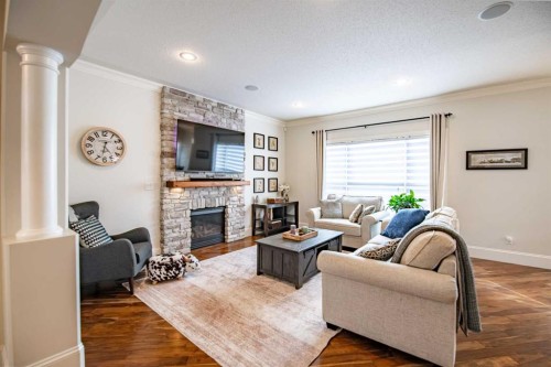 7 Aldrich Close, Red Deer, AB - Indoor Photo Showing Living Room With Fireplace