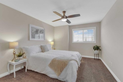 9 Ross Close, Sylvan Lake, AB - Indoor Photo Showing Bedroom