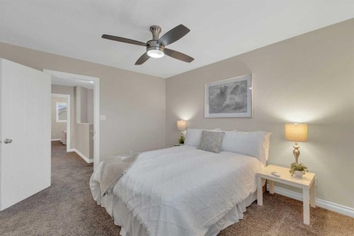 9 Ross Close, Sylvan Lake, AB - Indoor Photo Showing Bedroom