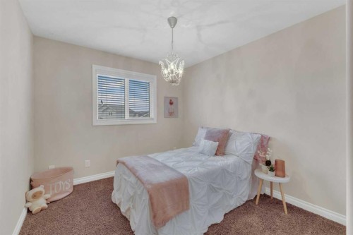 9 Ross Close, Sylvan Lake, AB - Indoor Photo Showing Bedroom