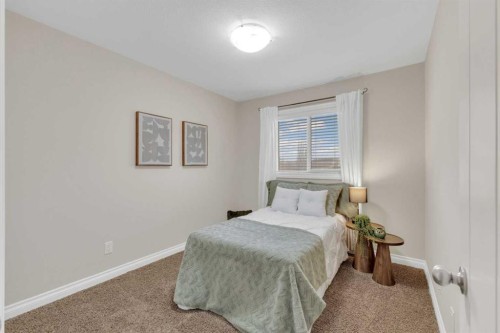 9 Ross Close, Sylvan Lake, AB - Indoor Photo Showing Bedroom