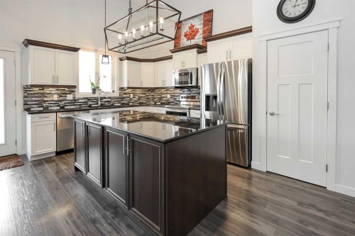 117 Coachman Way, Blackfalds, AB - Indoor Photo Showing Kitchen With Upgraded Kitchen
