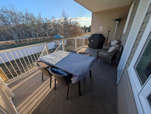 117 Coachman Way, Blackfalds, AB - Outdoor With Deck Patio Veranda With Exterior