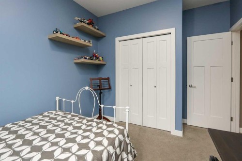 117 Coachman Way, Blackfalds, AB - Indoor Photo Showing Bedroom