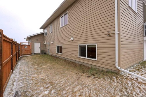 117 Coachman Way, Blackfalds, AB - Outdoor With Exterior