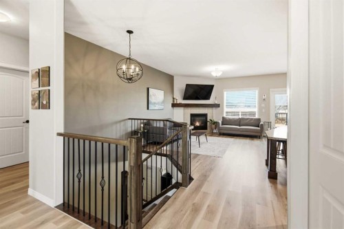 12 Cyprus Road, Blackfalds, AB - Indoor Photo Showing Other Room With Fireplace
