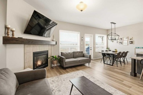 12 Cyprus Road, Blackfalds, AB - Indoor Photo Showing Living Room With Fireplace