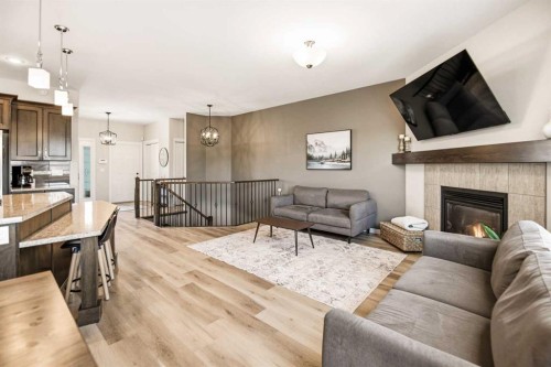 12 Cyprus Road, Blackfalds, AB - Indoor Photo Showing Living Room With Fireplace