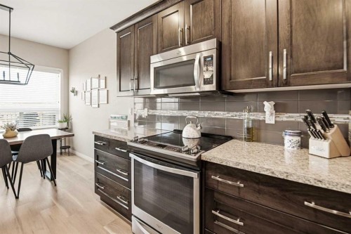 12 Cyprus Road, Blackfalds, AB - Indoor Photo Showing Kitchen With Upgraded Kitchen