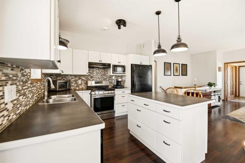 57 Woodbine Close, Blackfalds, AB - Indoor Photo Showing Kitchen With Double Sink With Upgraded Kitchen