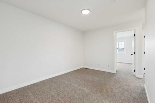 244 Drystone Walk Nw, Calgary, AB - Indoor Photo Showing Other Room