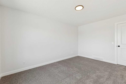 244 Drystone Walk Nw, Calgary, AB - Indoor Photo Showing Other Room