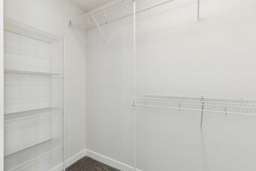 244 Drystone Walk Nw, Calgary, AB - Indoor With Storage