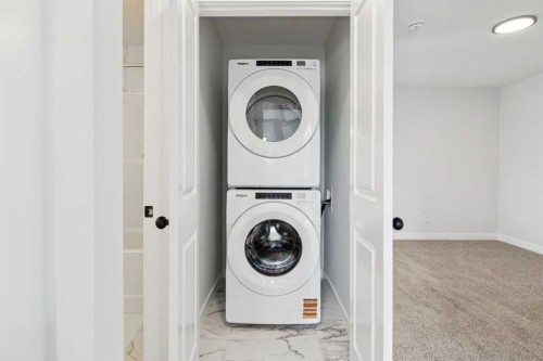 244 Drystone Walk Nw, Calgary, AB - Indoor Photo Showing Laundry Room