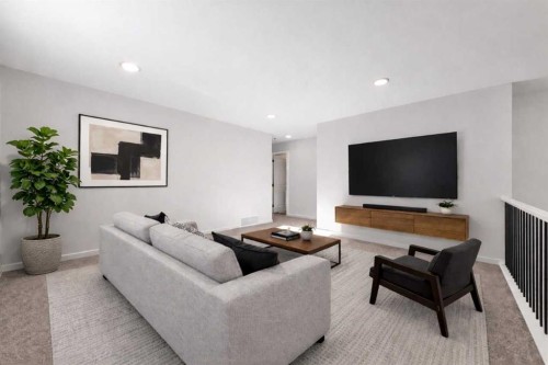 8 Heritage Link, Cochrane, AB - Indoor Photo Showing Living Room