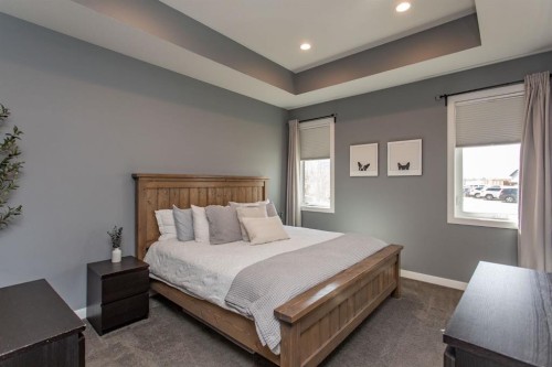 9 Bowman Circle, Sylvan Lake, AB - Indoor Photo Showing Bedroom