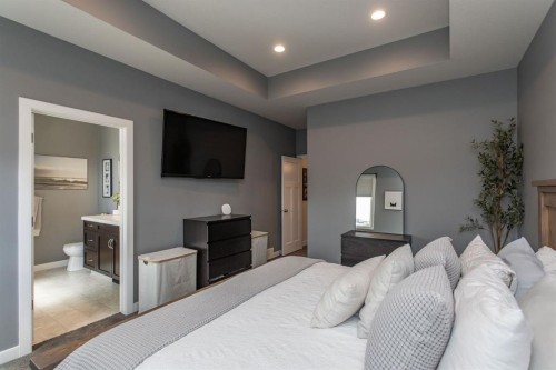 9 Bowman Circle, Sylvan Lake, AB - Indoor Photo Showing Bedroom