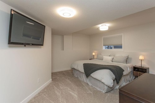 9 Bowman Circle, Sylvan Lake, AB - Indoor Photo Showing Bedroom