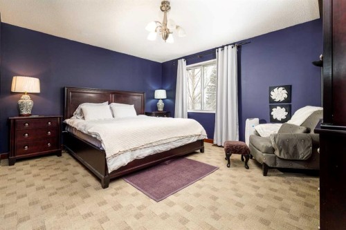 27 Wallace Close, Red Deer, AB - Indoor Photo Showing Bedroom
