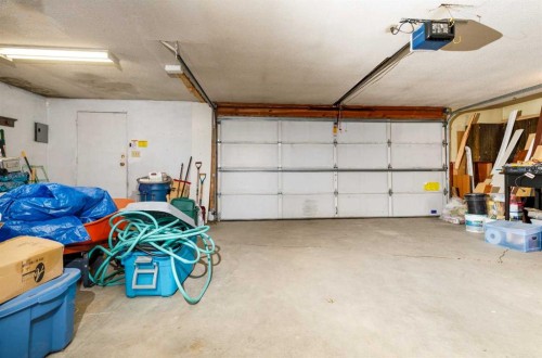 27 Wallace Close, Red Deer, AB - Indoor Photo Showing Garage