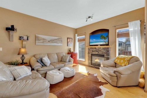 22 Jenner Crescent, Red Deer, AB - Indoor Photo Showing Living Room With Fireplace