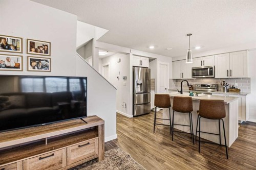 8 Springfield Boulevard, Sylvan Lake, AB - Indoor Photo Showing Kitchen With Upgraded Kitchen