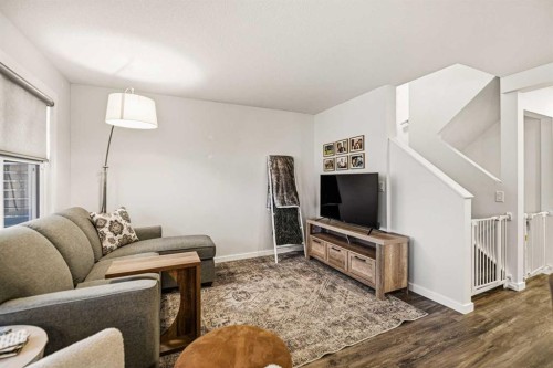 8 Springfield Boulevard, Sylvan Lake, AB - Indoor Photo Showing Living Room