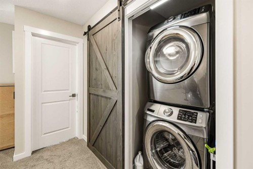 8 Springfield Boulevard, Sylvan Lake, AB - Indoor Photo Showing Laundry Room