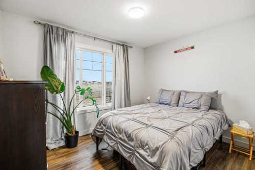 8 Springfield Boulevard, Sylvan Lake, AB - Indoor Photo Showing Bedroom