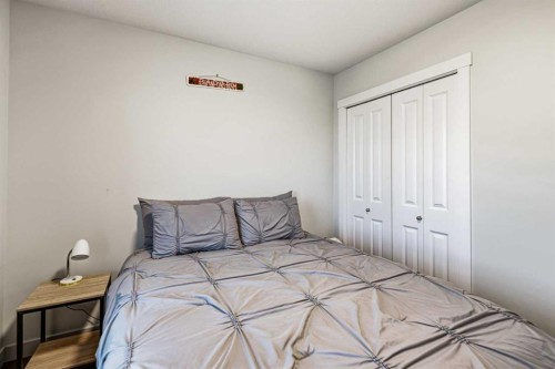 8 Springfield Boulevard, Sylvan Lake, AB - Indoor Photo Showing Bedroom