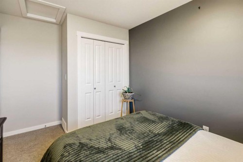 8 Springfield Boulevard, Sylvan Lake, AB - Indoor Photo Showing Bedroom