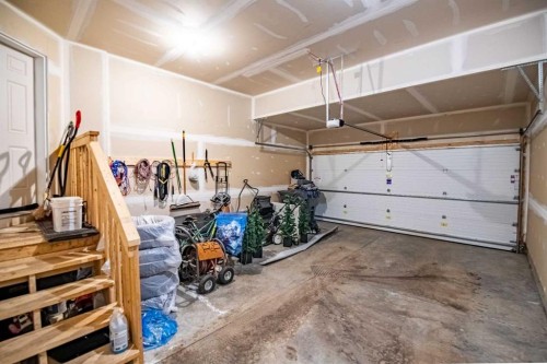 8 Springfield Boulevard, Sylvan Lake, AB - Indoor Photo Showing Garage