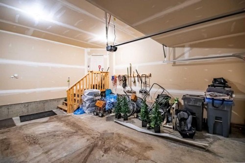 8 Springfield Boulevard, Sylvan Lake, AB - Indoor Photo Showing Garage