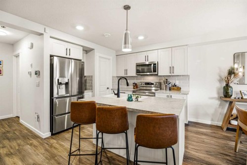 8 Springfield Boulevard, Sylvan Lake, AB - Indoor Photo Showing Kitchen With Upgraded Kitchen