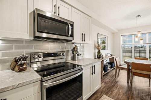 8 Springfield Boulevard, Sylvan Lake, AB - Indoor Photo Showing Kitchen With Upgraded Kitchen